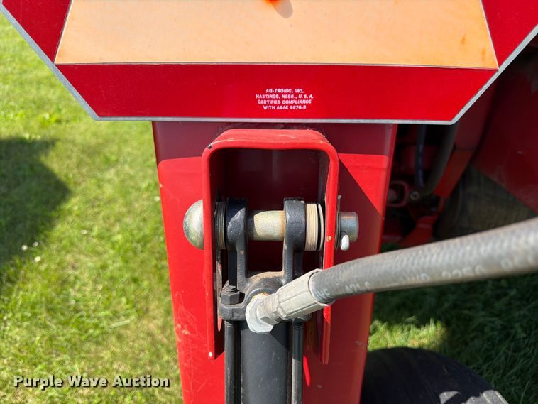 image for item EN0322 J.I. Case 3309 swather / windrower
