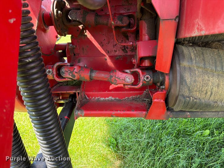 image for item EN0322 J.I. Case 3309 swather / windrower