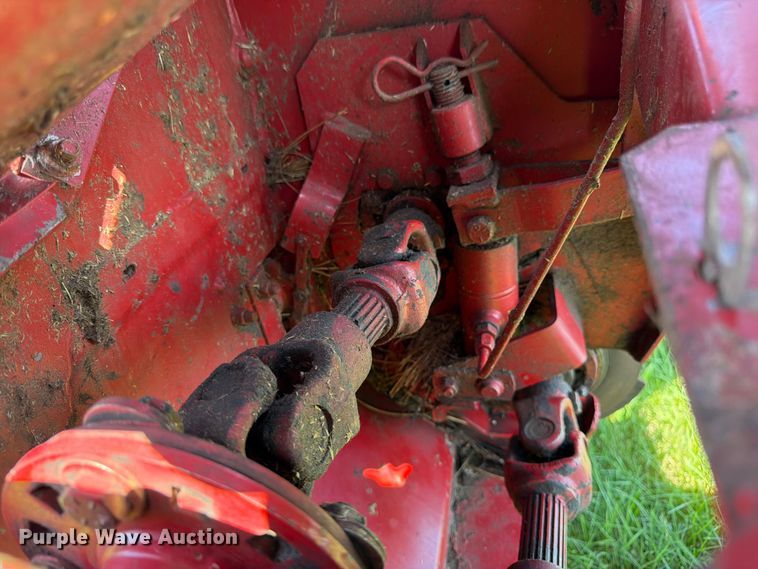 image for item EN0322 J.I. Case 3309 swather / windrower