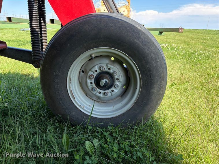 image for item EN0322 J.I. Case 3309 swather / windrower