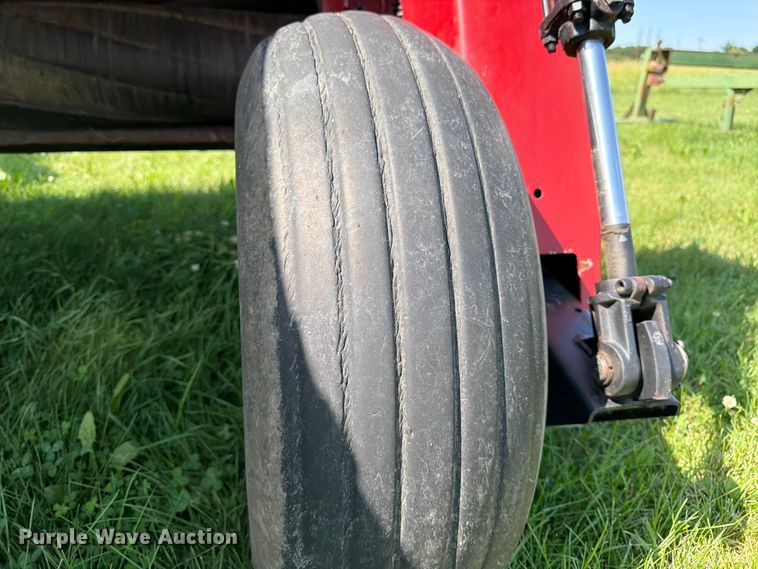 image for item EN0322 J.I. Case 3309 swather / windrower