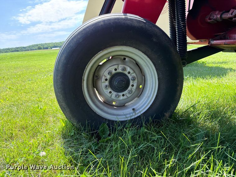 image for item EN0322 J.I. Case 3309 swather / windrower