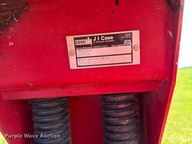 image for item EN0322 J.I. Case 3309 swather / windrower