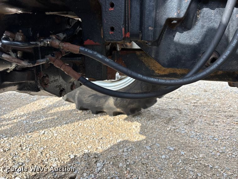 image for item ER3027 2004 New Holland TL90A MFWD tractor
