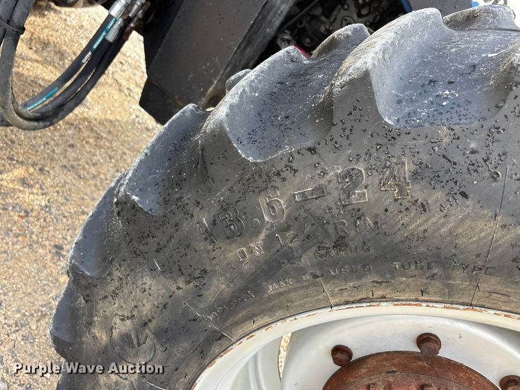 image for item ER3027 2004 New Holland TL90A MFWD tractor