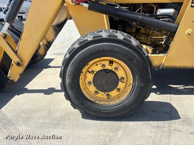 image for item ER7651 1999 New Holland 545D industrial tractor