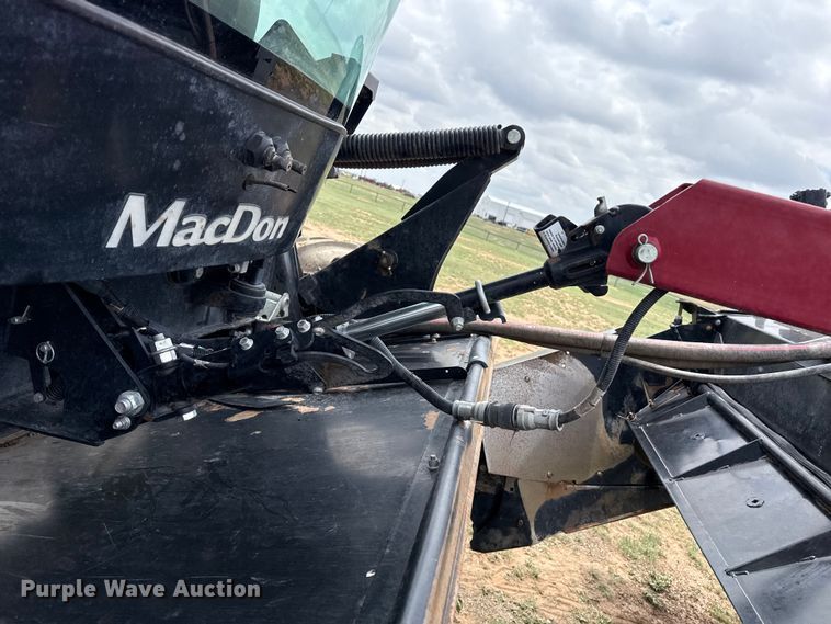 image for item FB6754 2022 Macdon M1240 swather / windrower