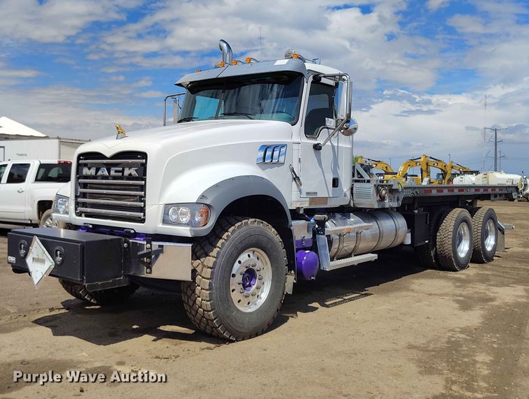 image for item ED0127 2023 Mack Granite roll-off container truck