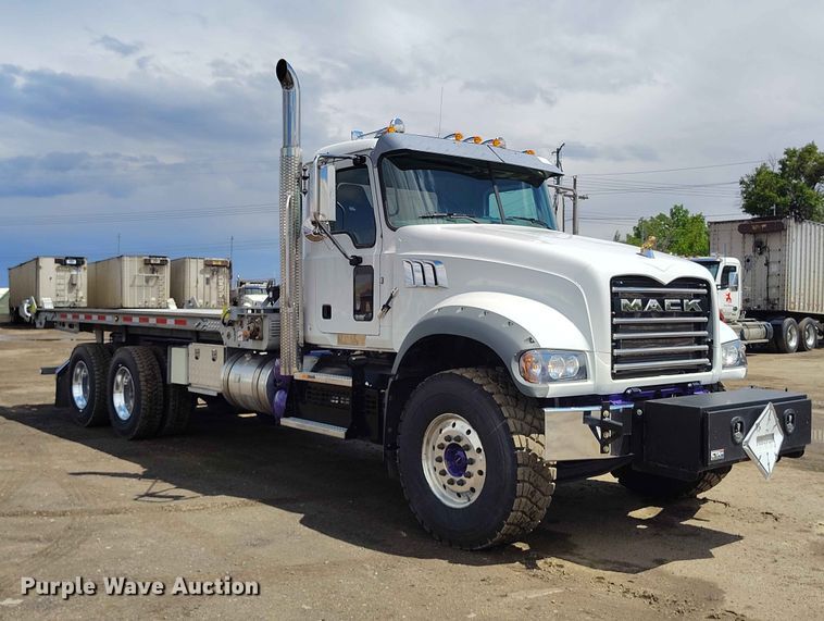 image for item ED0127 2023 Mack Granite roll-off container truck
