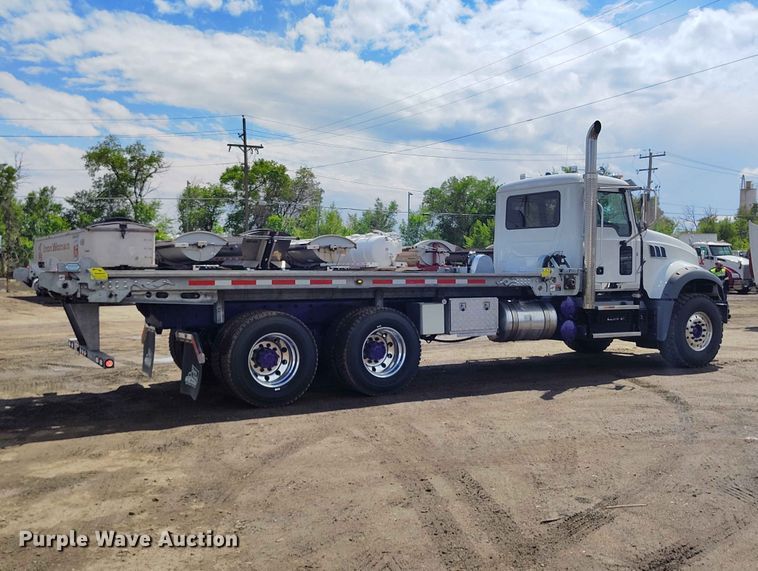 image for item ED0127 2023 Mack Granite roll-off container truck