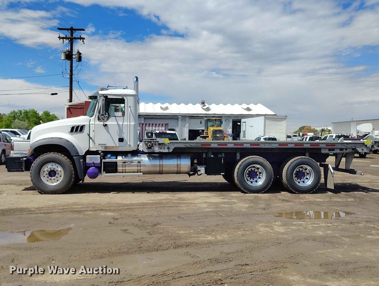 image for item ED0127 2023 Mack Granite roll-off container truck