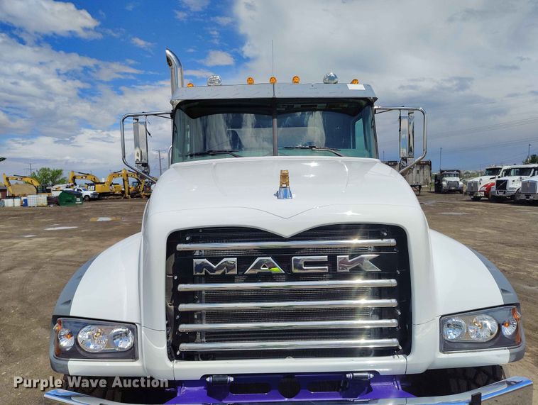 image for item ED0127 2023 Mack Granite roll-off container truck