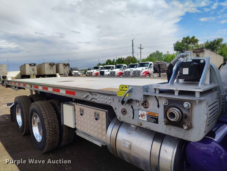 image for item ED0127 2023 Mack Granite roll-off container truck
