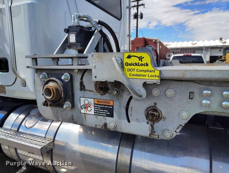 image for item ED0127 2023 Mack Granite roll-off container truck