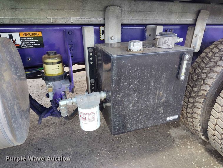 image for item ED0127 2023 Mack Granite roll-off container truck