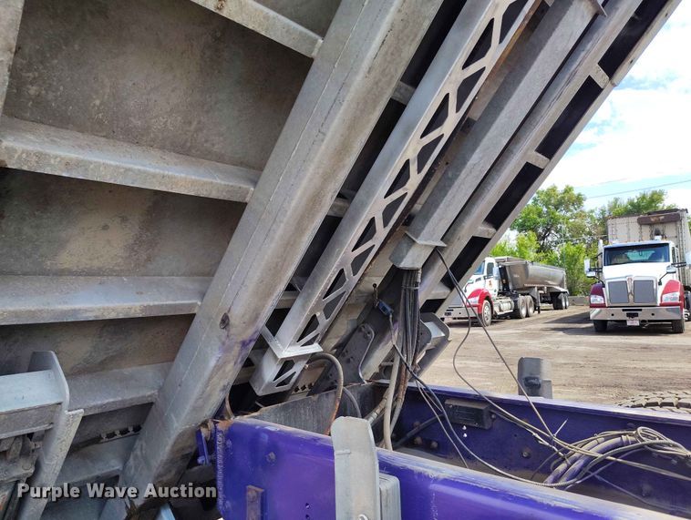 image for item ED0127 2023 Mack Granite roll-off container truck