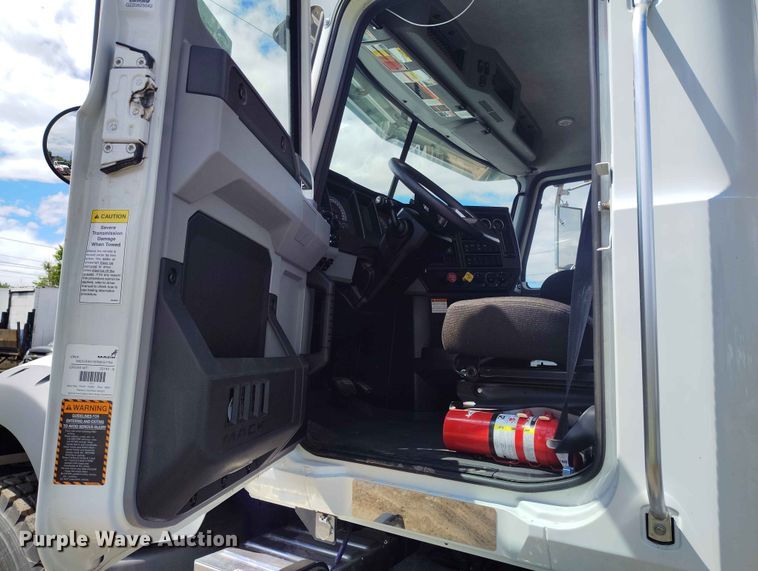 image for item ED0127 2023 Mack Granite roll-off container truck