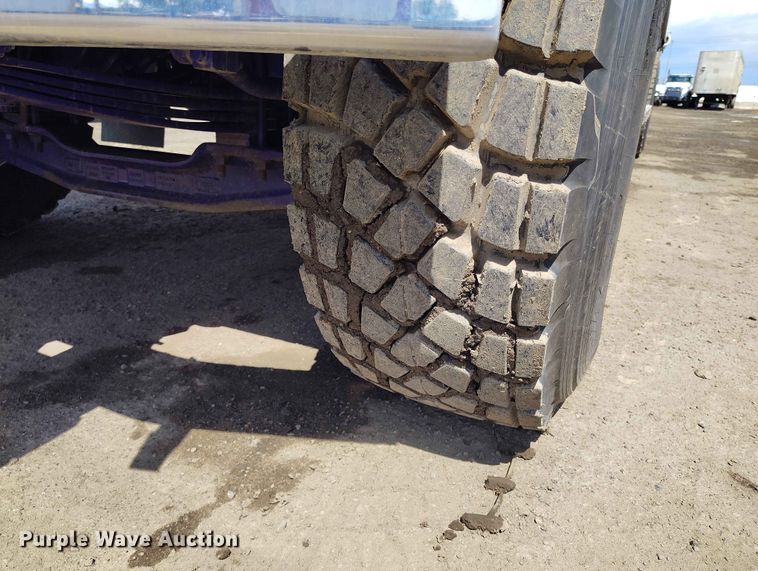image for item ED0127 2023 Mack Granite roll-off container truck