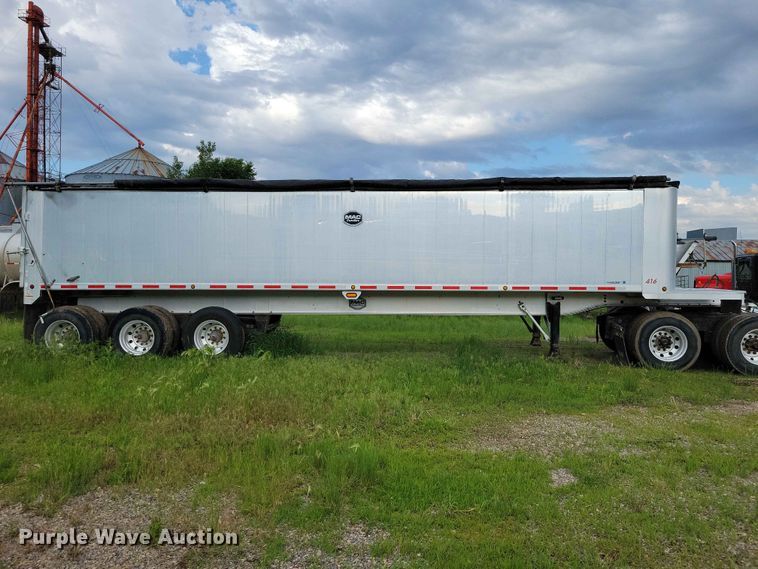 image for item EE1054 2015 Mac end dump trailer