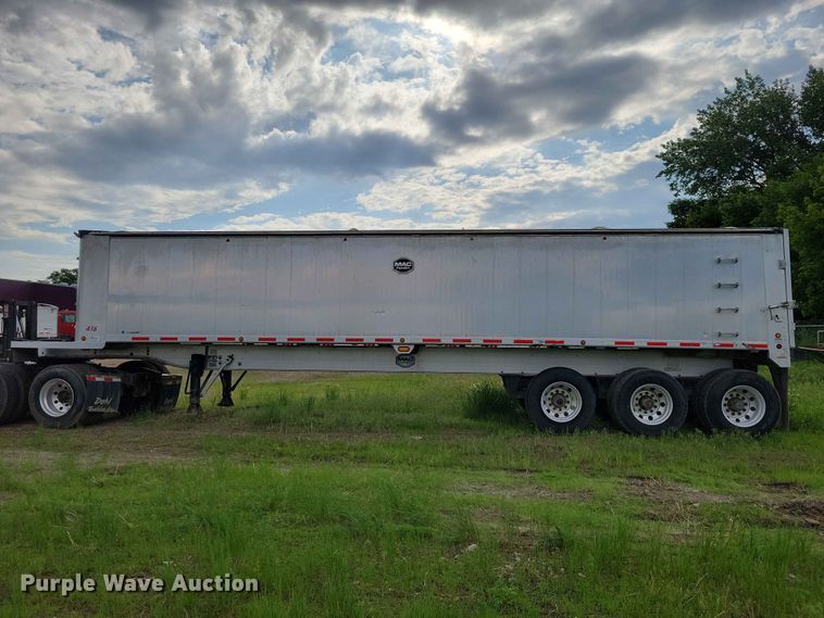 image for item EE1054 2015 Mac end dump trailer