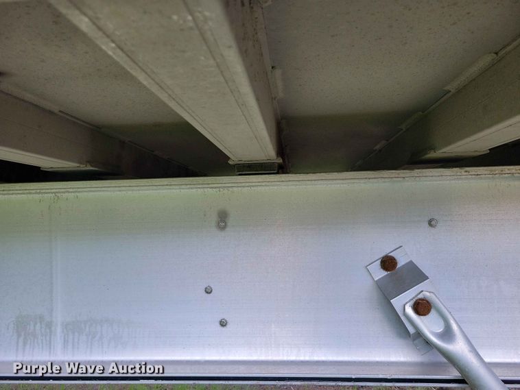 image for item EE1054 2015 Mac end dump trailer
