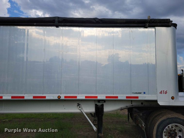 image for item EE1054 2015 Mac end dump trailer