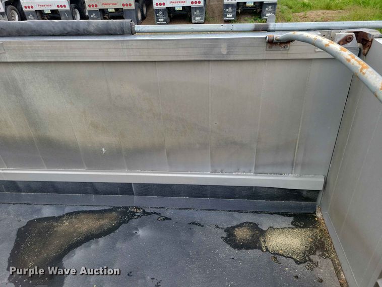 image for item EE1054 2015 Mac end dump trailer