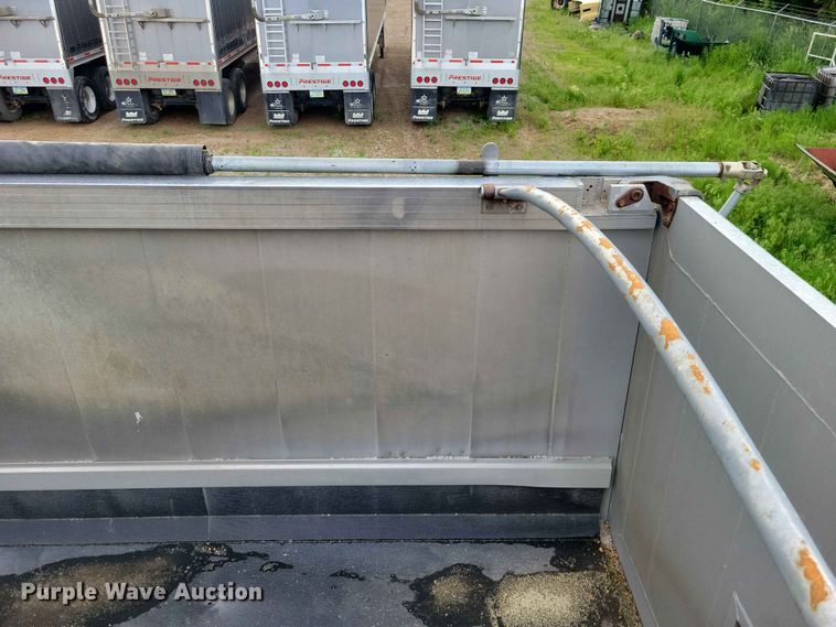 image for item EE1054 2015 Mac end dump trailer