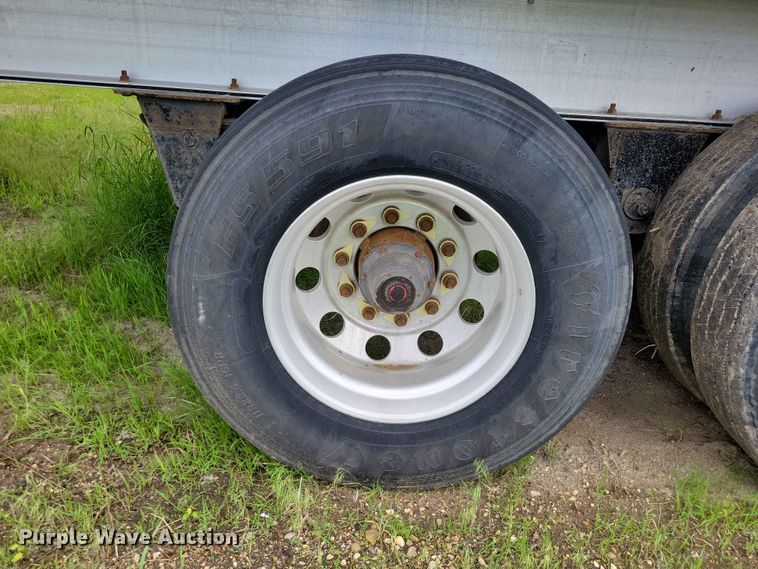 image for item EE1054 2015 Mac end dump trailer