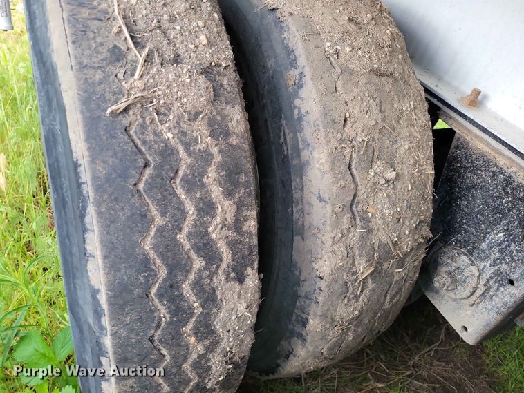 image for item EE1054 2015 Mac end dump trailer