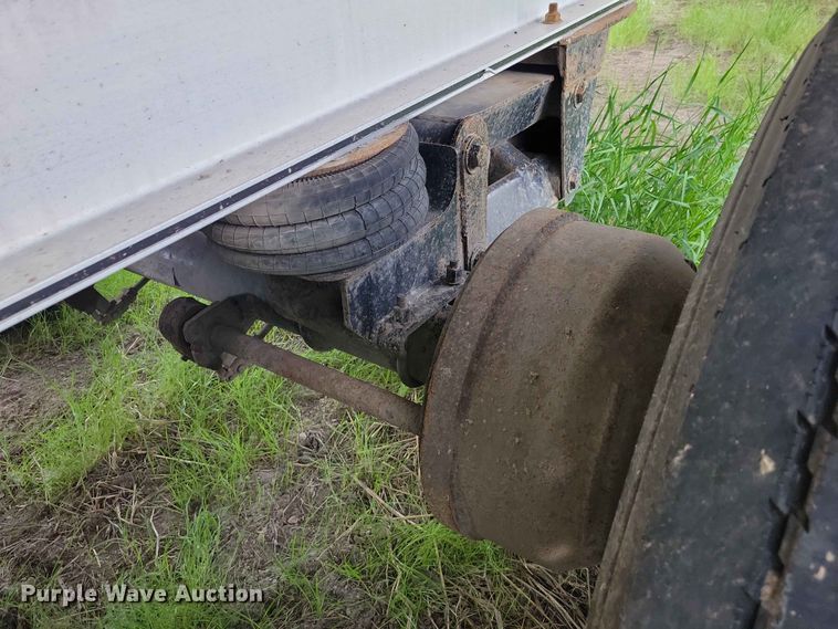 image for item EE1054 2015 Mac end dump trailer