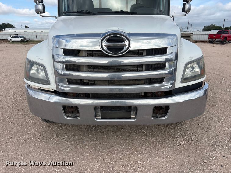 image for item FC2403 2016 Hino 268 rollback truck