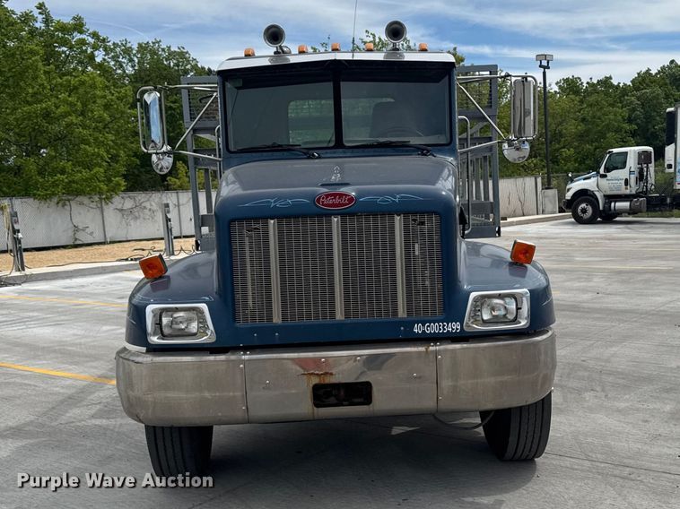 image for item OE9613 1999 Peterbilt 330 flatbed truck
