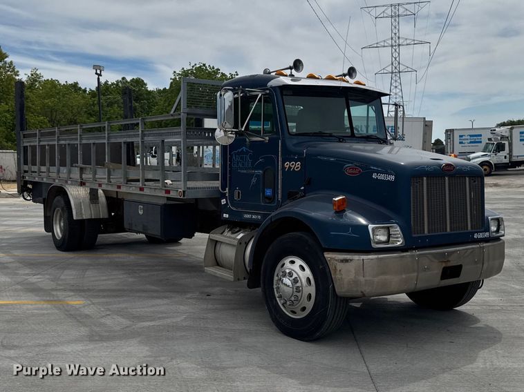 image for item OE9613 1999 Peterbilt 330 flatbed truck