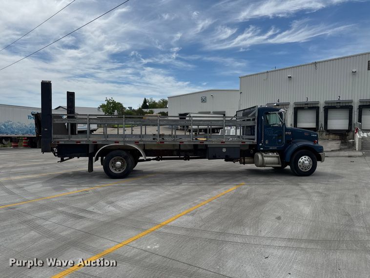 image for item OE9613 1999 Peterbilt 330 flatbed truck