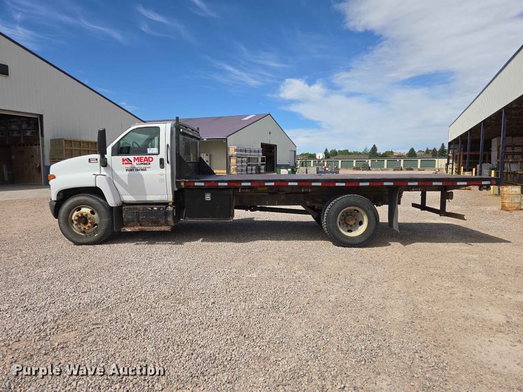 image for item DP8939 2005 GMC C6500 dump flatbed truck