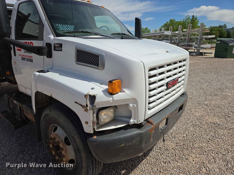 image for item DP8939 2005 GMC C6500 dump flatbed truck
