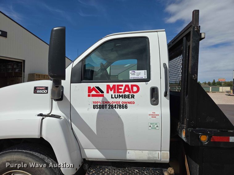 image for item DP8939 2005 GMC C6500 dump flatbed truck