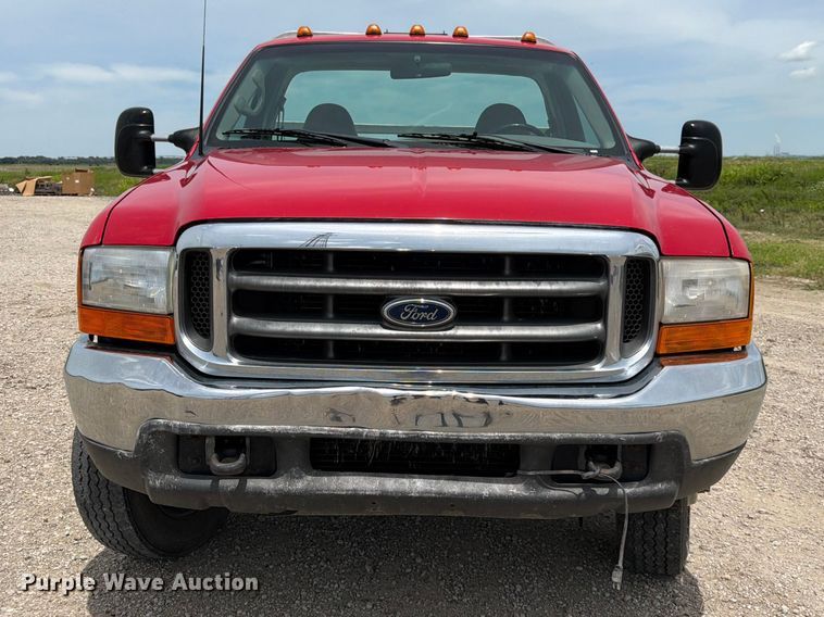 image for item DQ7861 1999 Ford F550 rollback truck