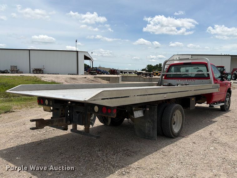 image for item DQ7861 1999 Ford F550 rollback truck
