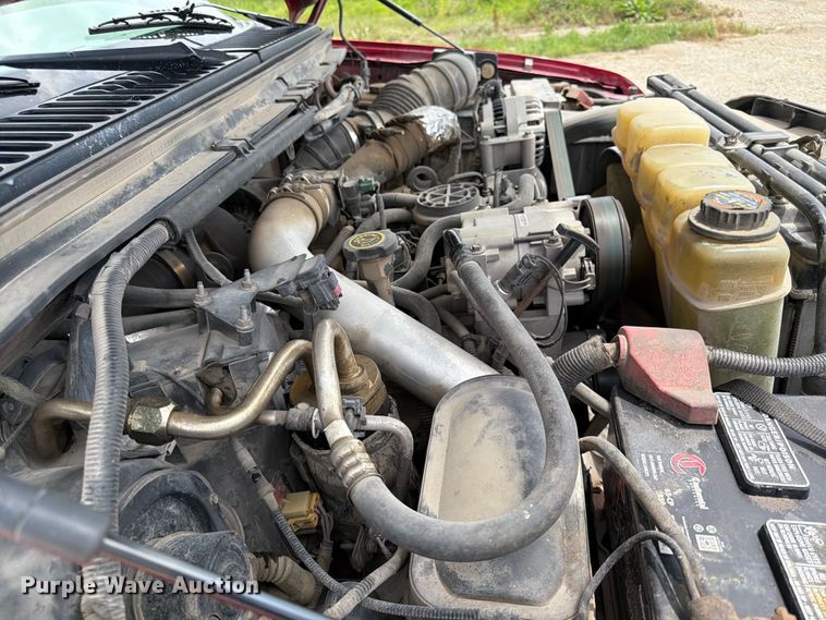 image for item DQ7861 1999 Ford F550 rollback truck