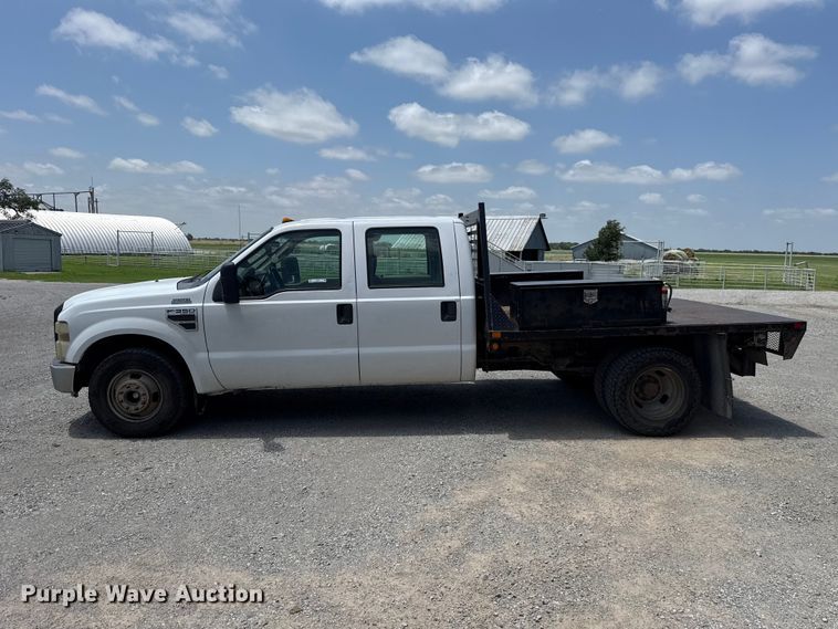 image for item ET6311 2008 Ford F350 Super Duty Crew Cab flatbed pickup truck
