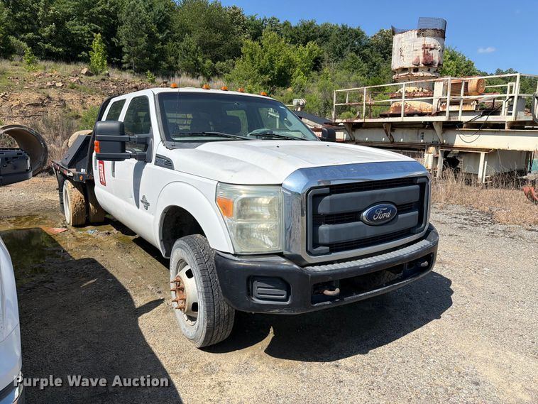 image for item EW0011 2015 Ford F350 Super Duty Crew Cab flatbed pickup truck