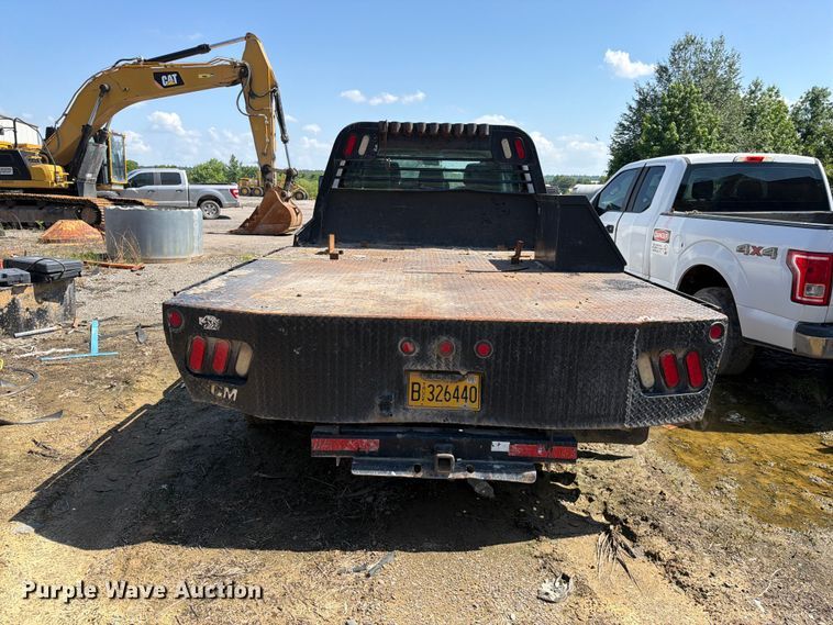 image for item EW0011 2015 Ford F350 Super Duty Crew Cab flatbed pickup truck