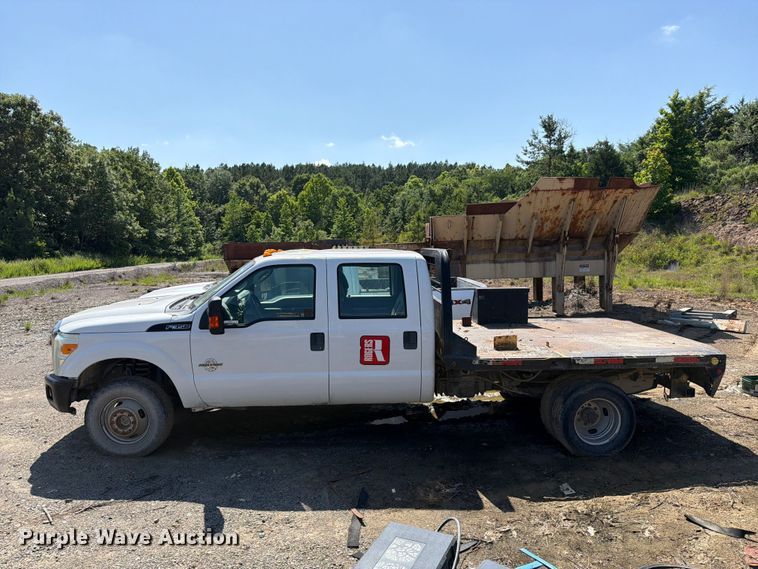 image for item EW0011 2015 Ford F350 Super Duty Crew Cab flatbed pickup truck