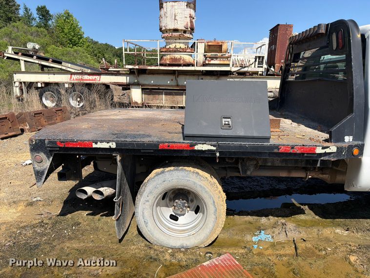 image for item EW0011 2015 Ford F350 Super Duty Crew Cab flatbed pickup truck