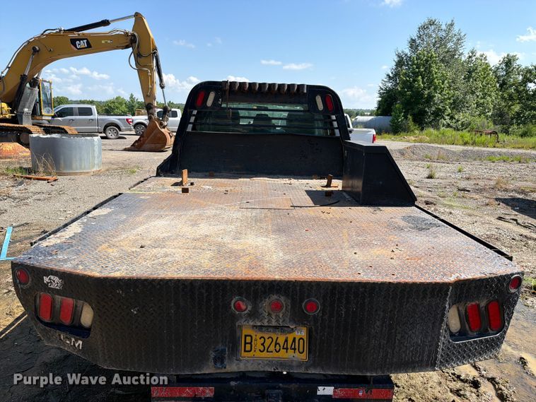 image for item EW0011 2015 Ford F350 Super Duty Crew Cab flatbed pickup truck