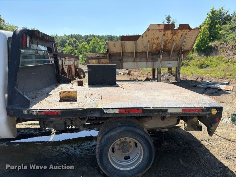 image for item EW0011 2015 Ford F350 Super Duty Crew Cab flatbed pickup truck