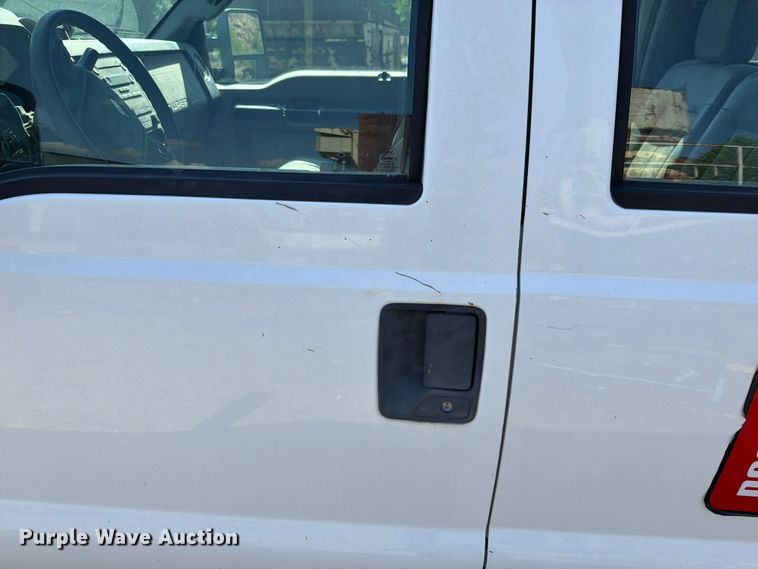 image for item EW0011 2015 Ford F350 Super Duty Crew Cab flatbed pickup truck