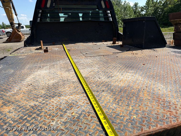 image for item EW0011 2015 Ford F350 Super Duty Crew Cab flatbed pickup truck